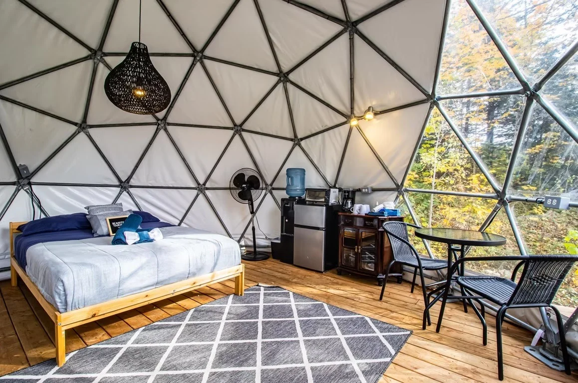 inside dome beausite tourisme quebec unusual accommodation with view on the forest